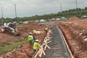 Construction crew installing formwork and reinforcement for ABB Electrification drainage structure