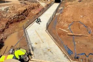 Concrete drainage channel and retaining wall construction at ABB Electrification facility