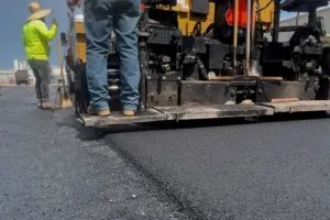Asphalt paving operation at Kohler manufacturing facility in Huntsville, Alabama