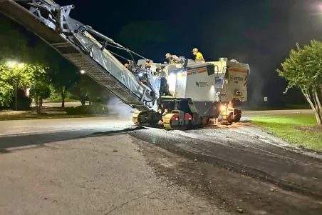Wright Construction Company in Huntsville, AL performing ADA compliance, asphalt mill/pave, concrete, striping for the Whitesburg Plaza Shopping Center
